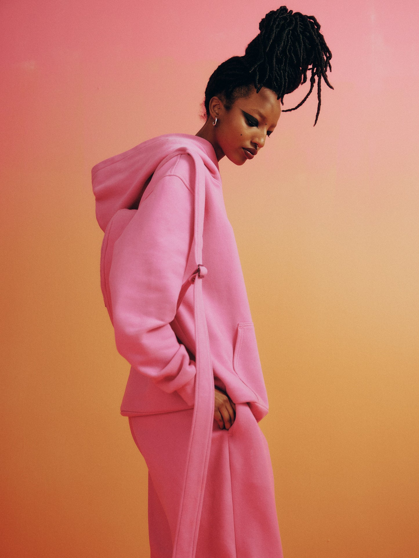 pink vegan sweatshirt by canadian fashion designer maria karimi and cruelty free brand mindful pigs.