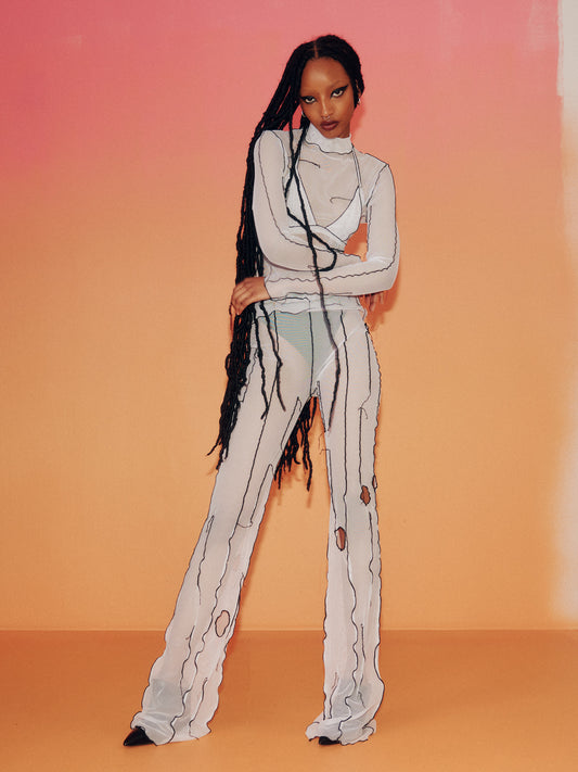 Pantalon évasé en filet blanc