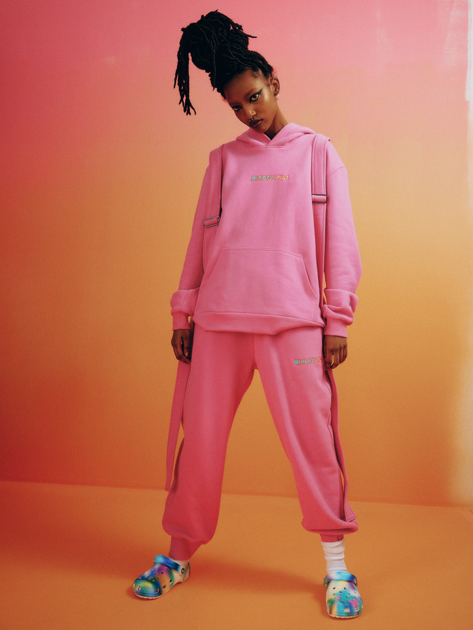 vegan streetwear pink hoodie by mindful pigs brand 